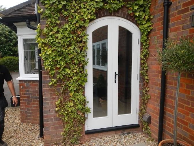 Curved double patio doors