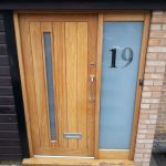 Timber entrance door with sidelight and frosted glass