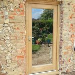 A timber external door with glazed pane