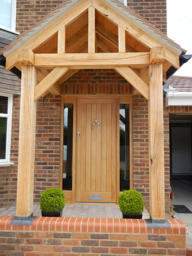 An oak front door with oak porch