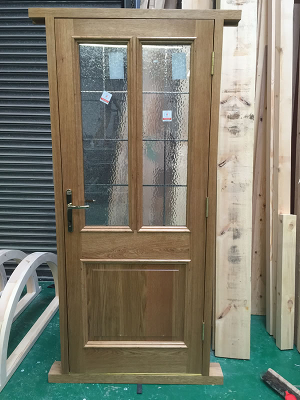 Timber door with lead details in our factory