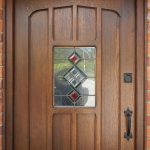 Timber door with custom moulded panel