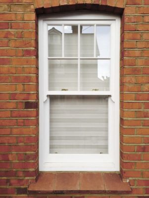 Timber sliding sash window in white