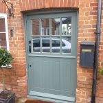 Timber stable door in traditional green