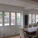 Folding timber doors glazed