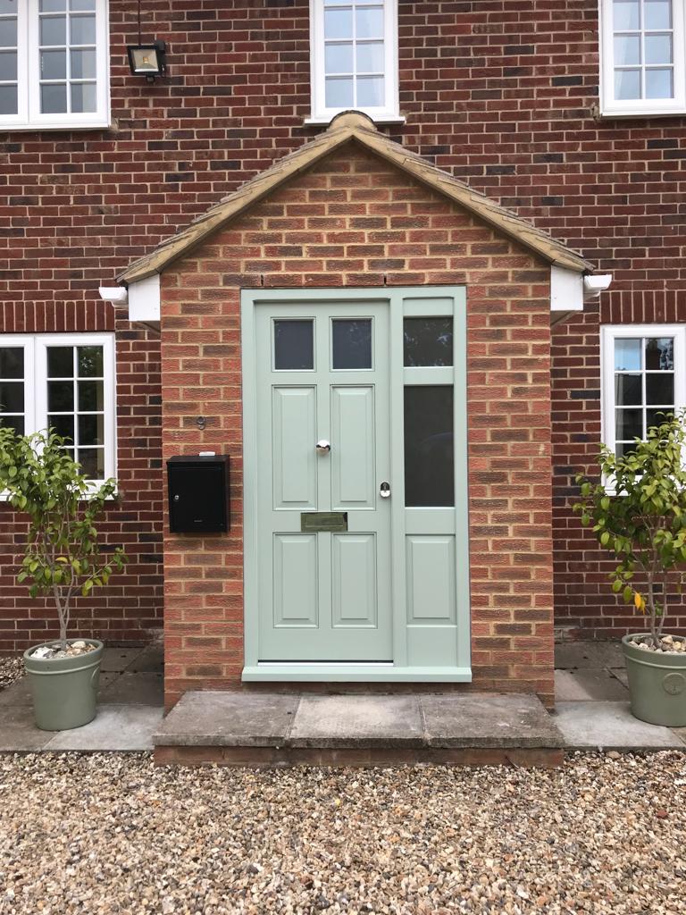 Hardwood painted front door with sidelight